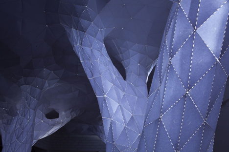 Glowing indoor forest made from paper by Orproject