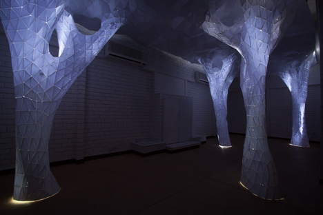 Glowing indoor forest made from paper by Orproject