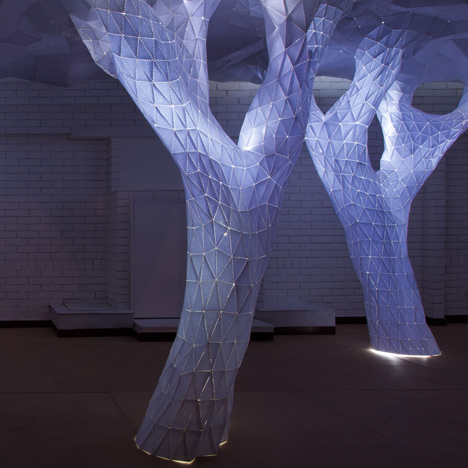Glowing indoor forest made from paper by Orproject