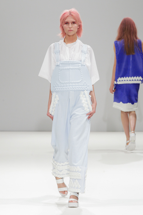 Silicon details outline garments in Xiao Li's Autumn Winter 2014 collection
