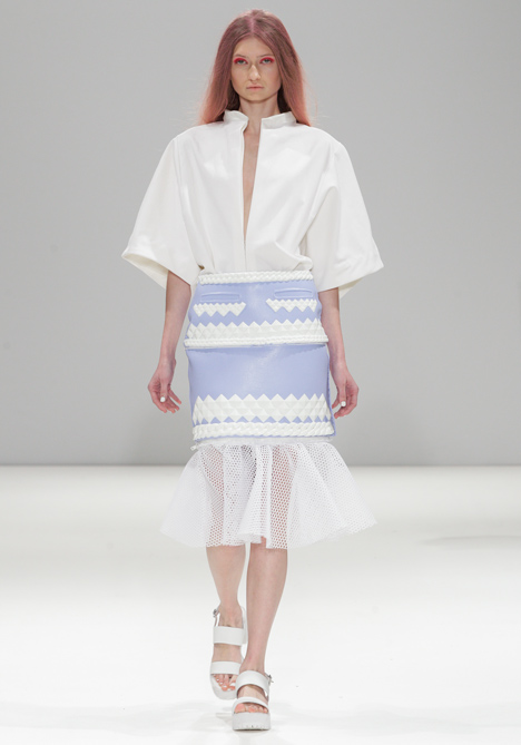 Silicon details outline garments in Xiao Li's Autumn Winter 2014 collection