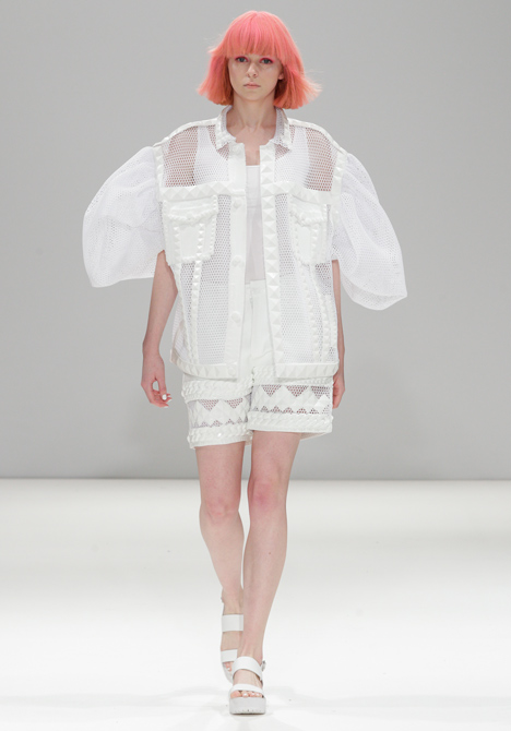 Silicon details outline garments in Xiao Li's Autumn Winter 2014 collection