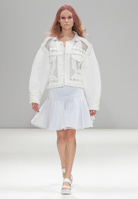 Silicon details outline garments in Xiao Li's Autumn Winter 2014 collection