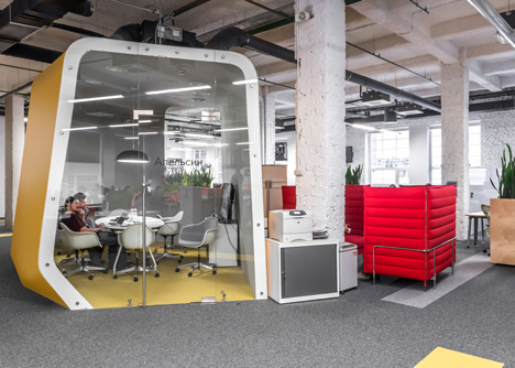 Colourful pods house meeting rooms in IT firm offices by Za Bor Architects