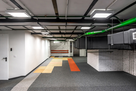 Colourful pods house meeting rooms in IT firm offices by Za Bor Architects