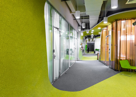 Colourful pods house meeting rooms in IT firm offices by Za Bor Architects