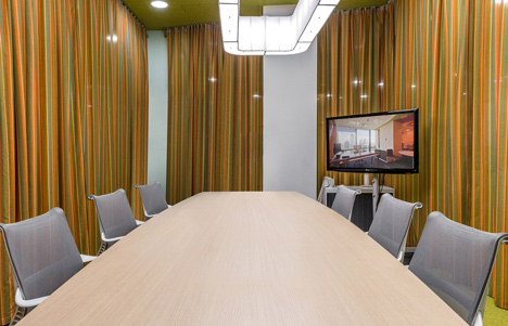 Colourful pods house meeting rooms in IT firm offices by Za Bor Architects
