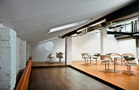 Colourful pods house meeting rooms in IT firm offices by Za Bor Architects