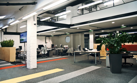 Colourful pods house meeting rooms in IT firm offices by Za Bor Architects