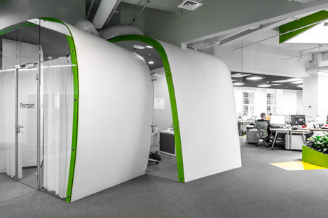 Colourful pods house meeting rooms in IT firm offices by Za Bor Architects