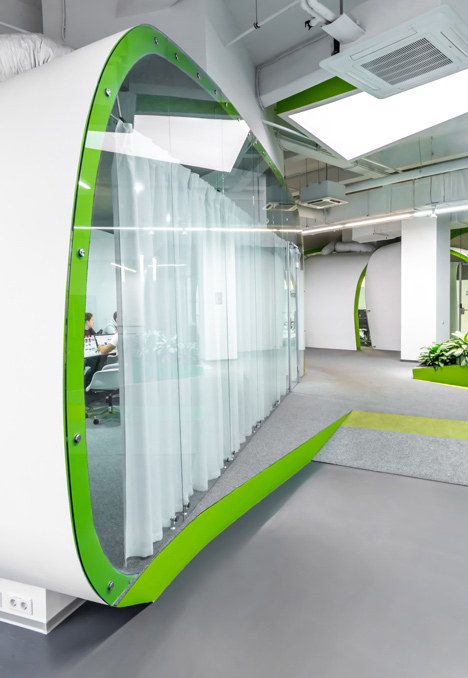 Colourful pods house meeting rooms in IT firm offices by Za Bor Architects