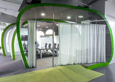 Colourful pods house meeting rooms in IT firm offices by Za Bor Architects