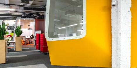 Colourful pods house meeting rooms in IT firm offices by Za Bor Architects