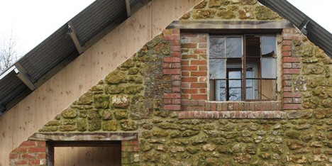 Hugh Strange Architects slots architectural archive inside old farmyard barn
