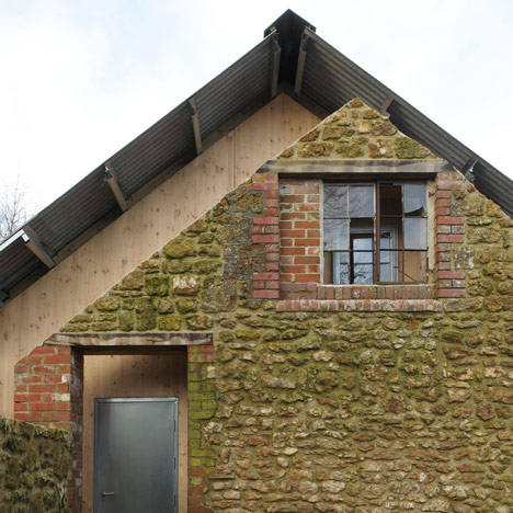 Hugh Strange Architects slots architectural archive inside old farmyard barn