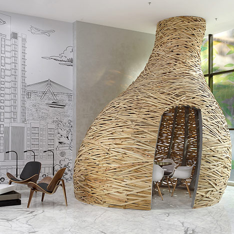 Giant timber nest provides meeting room at Baya Park offices by Planet 3 Studios