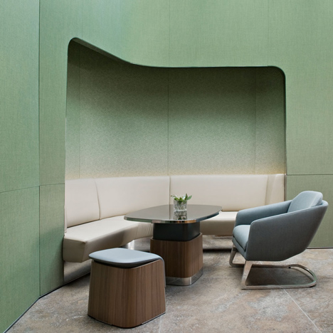 Nature-inspired hotel by Jouin Manku features an organic fireplace