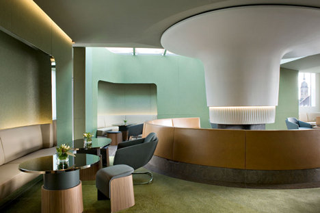 Nature-inspired hotel by Jouin Manku features an organic fireplace