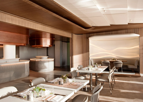 Nature-inspired hotel by Jouin Manku features an organic fireplace