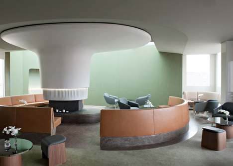 Nature-inspired hotel by Jouin Manku features an organic fireplace