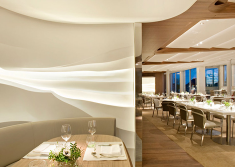 Nature-inspired hotel by Jouin Manku features an organic fireplace
