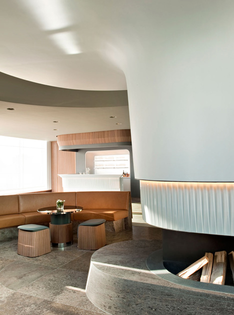 Nature-inspired hotel by Jouin Manku features an organic fireplace
