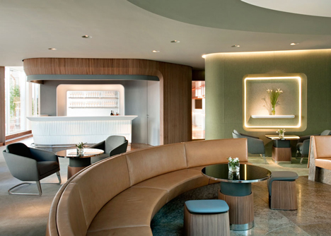 Nature-inspired hotel by Jouin Manku features an organic fireplace