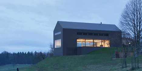 Black Barn by Arhitektura d.o.o. used for production of dried fruit and honey