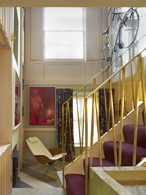 AOC Architecture adds wall-hung bicycles and basket-weave flooring to London townhouse