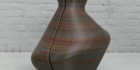 Dirk Vander Kooij uses a robotic arm to print vases from scrap plastic