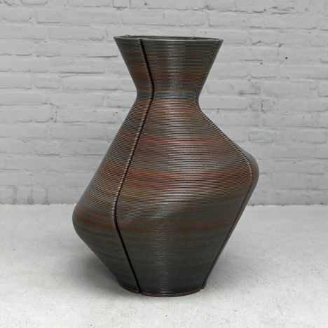 Dirk Vander Kooij uses a robotic arm to print vases from scrap plastic