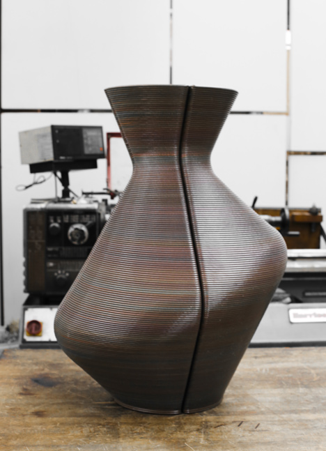 Dirk Vander Kooij uses a robotic arm to print vases from scrap plastic