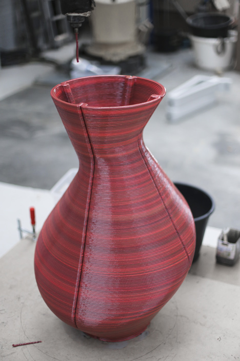 Dirk Vander Kooij uses a robotic arm to print vases from scrap plastic
