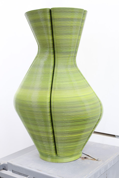 Dirk Vander Kooij uses a robotic arm to print vases from scrap plastic