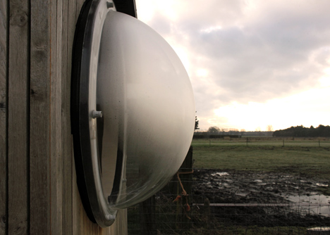 Abandoned trailer converted into garden hideaway by Karel Verstraeten
