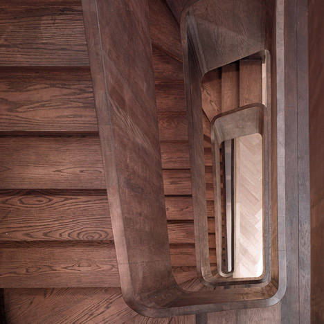 Curvacious oak staircase ascends through converted London convent by John Smart Architects