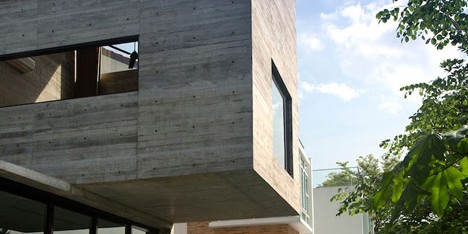 Formwerkz Architects house extension features cantilevered concrete box