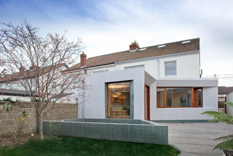 Tile-covered walls reflect light into Greenlea Road extension by GKMP Architects Tile-covered walls reflect light into Greenlea Road extension by GKMP Architects