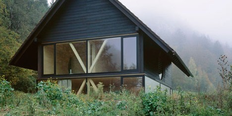 Pascal Flammer’s House in Balsthal features wooden braces and a circular window