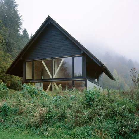 Pascal Flammer’s House in Balsthal features wooden braces and a circular window