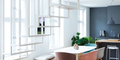 Floating steel staircase divides Haptic's Idunsgate Apartment in Oslo