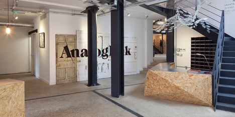 Industrial-style offices by DH Liberty mix reclaimed objects with minimal aesthetic