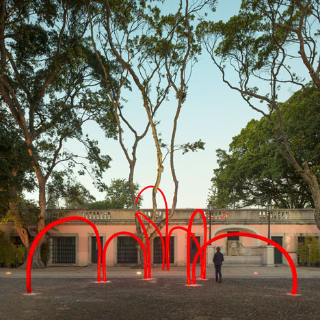 Luminous red arches by LIKEarchitects installed at Portuguese palace