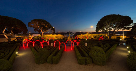 Luminous red arches by LIKEarchitects installed at Portuguese palace