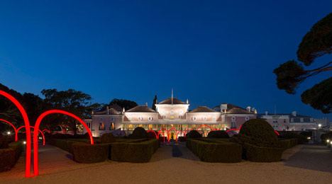 Luminous red arches by LIKEarchitects installed at Portuguese palace