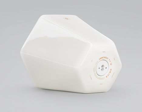 Wireless hexagonal ceramic speaker connects to others by rolling over
