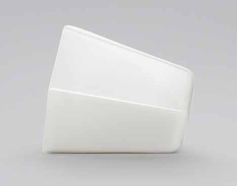 Wireless hexagonal ceramic speaker connects to others by rolling over