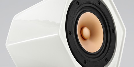 Wireless hexagonal ceramic speaker connects to others by rolling over