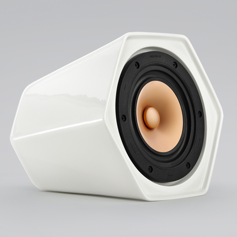 Wireless hexagonal ceramic speaker connects to others by rolling over