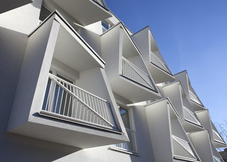 Angular balconies stretch towards sunlight at North Star Apartments by Nice Architects